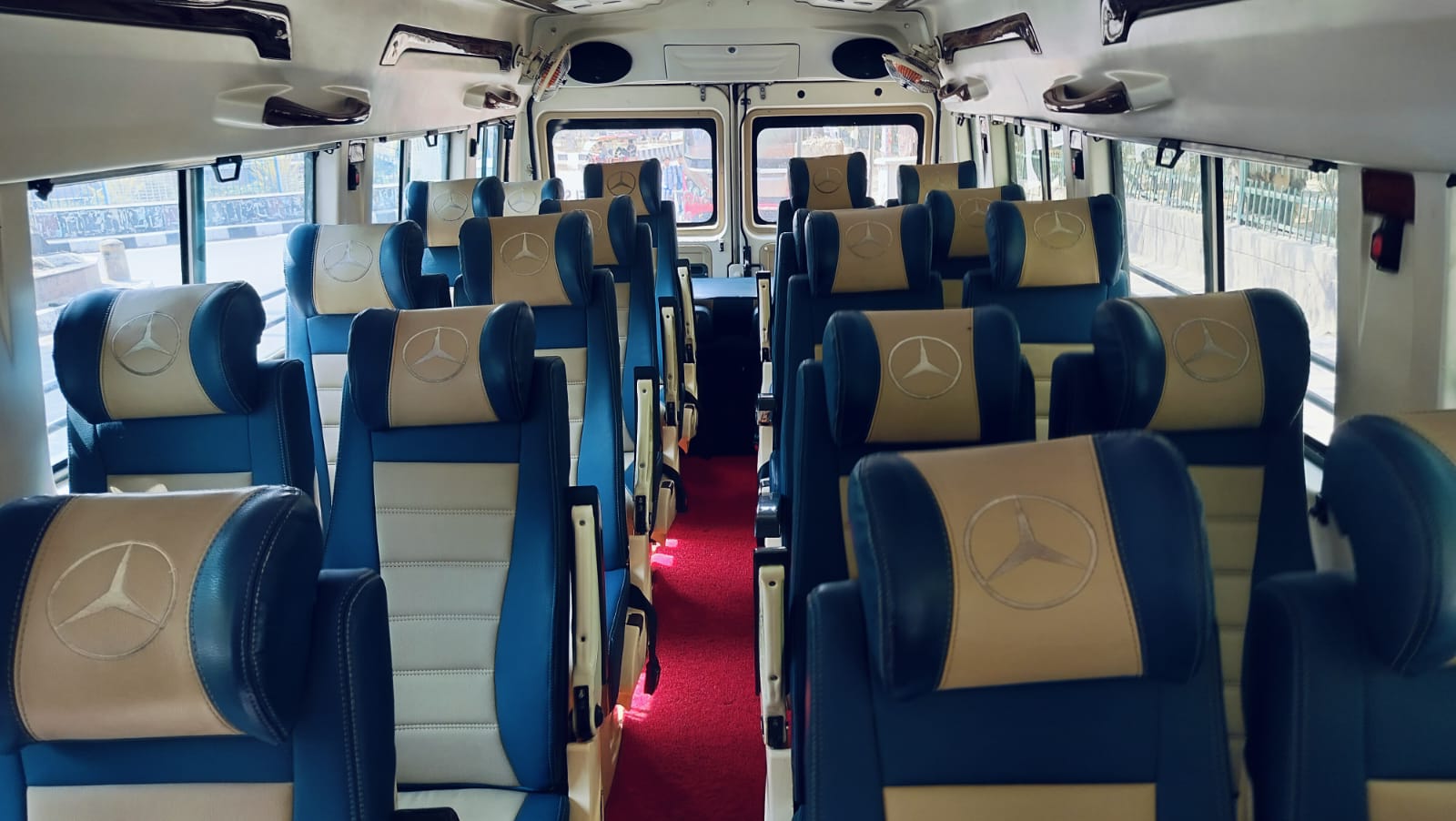 Spacious 26 seater Tempo Traveller interior